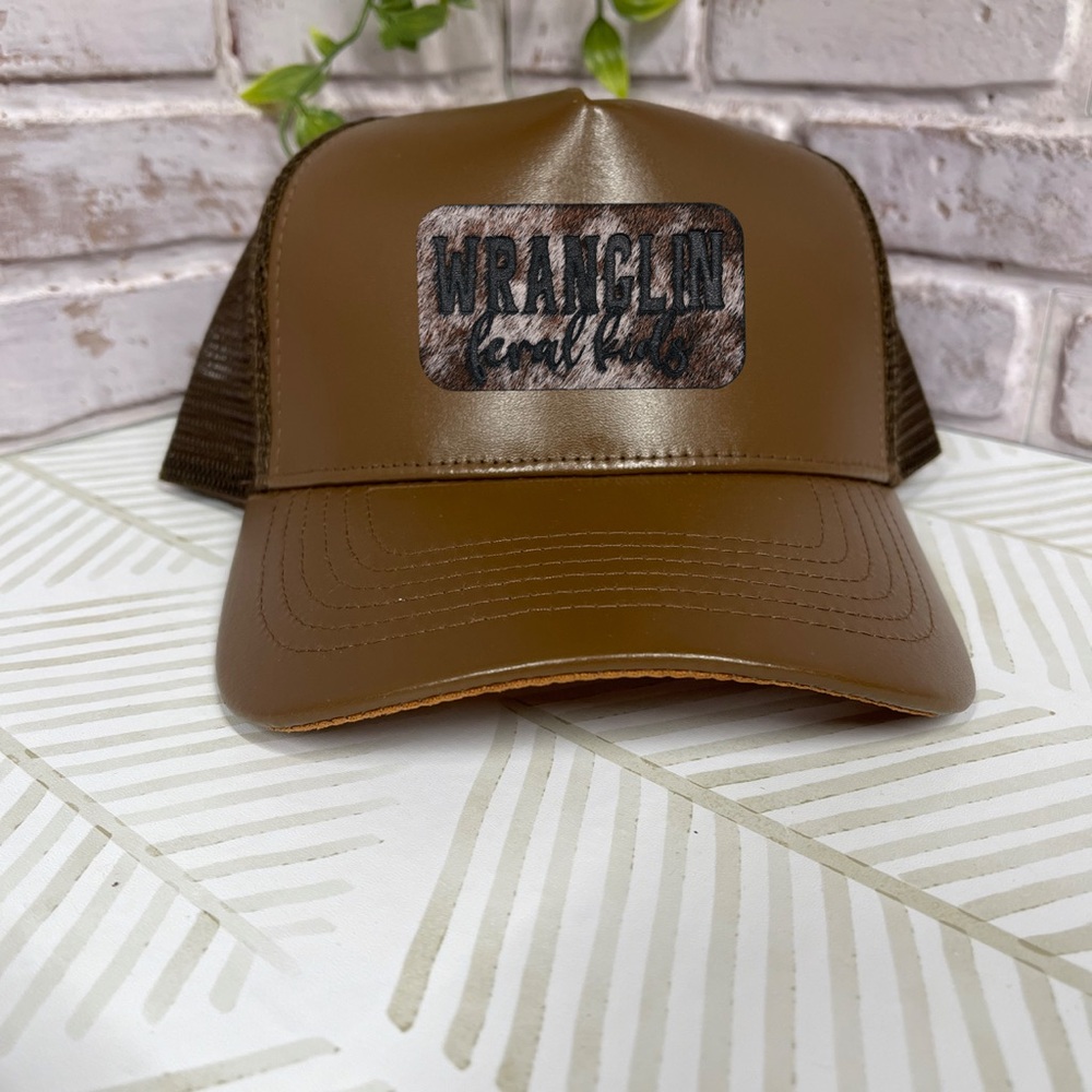 Leatherette Brown Trucker Hat “Wranglin Feral Kids” Cowhide Patch